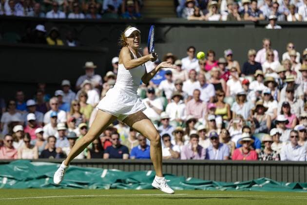 29.06.2015. Wimbledon, England. The Wimbledon Tennis Championships. Ladies& x2019; Singles first round match between fourth seed Maria Sharapova (RUS) &amp; Johanna Konta (GBR). Maria Sharapova in action xCraigxMercerx  ActionPlus11636215