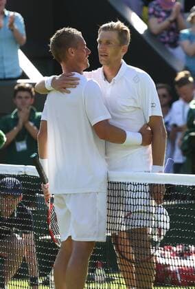 Australian Lleyton Hewitt congratulates Finland s Jarkko Nieminen on day one of the 2015 Wimbledon championships, London on June 29, 2015. Nieminen won the match 6-3, 3-6, 6-4, 0-6, 9-11.  LON2015062961 HUGOxPHILPOTT