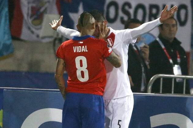 Chile s player Arturo Vidal, left, faces Carlos Zambrano of Peru during the 2015 Copa America football championship semifinal match at the National stadium in Santiago, Chile. 29 06 2015 AndresxPina Photosport Chile v Peru, Copa America 2015. 