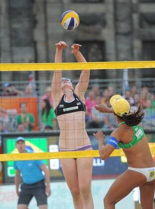 World Championships Beach volleyball Beachvolleyball 2015 The Netherlands World Championships Beach Volleyball 2015 The Netherlands 29th June 2015 Joy as German duo Julie Sude and Chantal Laboureur beat Maria Antonelli and Juliana da Silva (BRA) in a very close match on the Dam in Amsterdam. By winning the match the couple top their poule. Laboureur tips the ball over the net. Photo Richard Wareham 