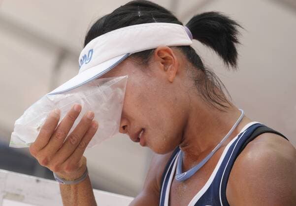 Tanarattha of Thailand cools down with ice during the FIVB Beach volleyball Beachvolleyball World Championships female match between Thailand vs Netherlands at pool B on June 30, 2015 in Amsterdam, Netherlands. Imago Paulo Amorim