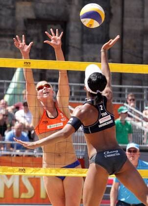 Udomchavee of Thailand attacks Van Gestel (L) of Netherlands during the FIVB Beach volleyball Beachvolleyball World Championships female match between Thailand vs Netherlands at pool B on June 30, 2015 in Amsterdam, Netherlands. Imago Paulo Amorim