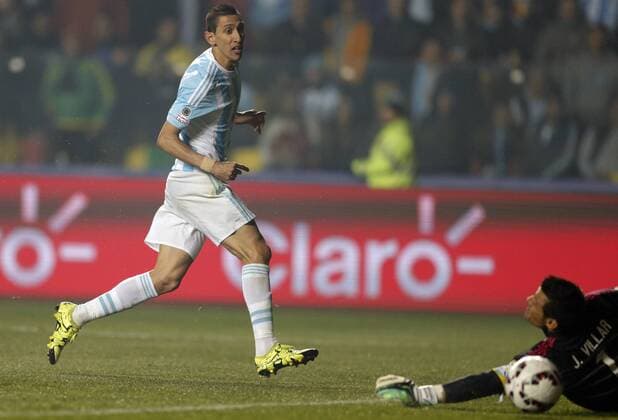 CONCEPCION, June 30, 2015 -- Angel Di Maria (L) of Argentina kicks a goal during the semifinal between Argentina and Paraguay at the 2015 Copa America, in Concepcion, Chile, on June 30, 2015. Argentina won 6-1 and was qualified for the final. ) (SP)CHILE-CONCEPCION-COPA AMERICA-SEMIFINAL-ARGENTINA VS PARAGUAY JorgexVillegas 