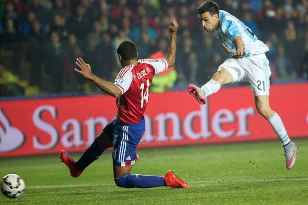 CONCEPCION, June 30, 2015 -- Javier Pastore (R) of Argentina kicks a goal during the semifinal between Argentina and Paraguay at the 2015 Copa America, in Concepcion, Chile, on June 30, 2015. Argentina won 6-1 and was qualified for the final. ) (SP)CHILE-CONCEPCION-COPA AMERICA-SEMIFINAL-ARGENTINA VS PARAGUAY PedroxMera 
