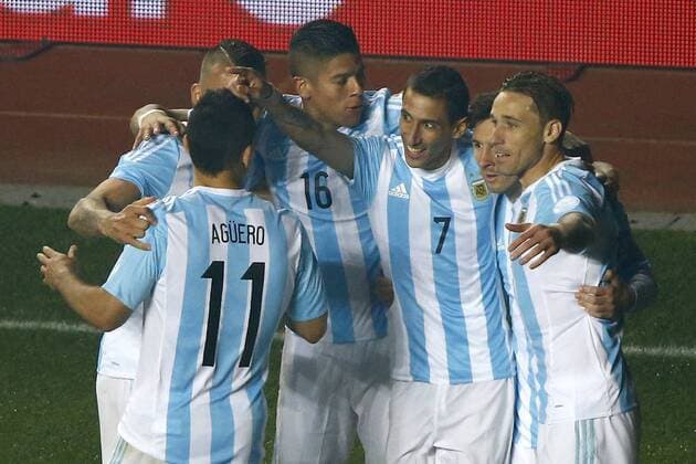 Argentina v Paraguay. Copa America Championship 2015 . Argentina s player Angel Di Maria, center, celebrates with teammates scoring against Paraguay during the 2015 Copa America football championship semifinal match at the Ester Roa stadium in Concepcion . 30 06 2015 Adrian Aylwin Photosport Argentina v Paraguay, Semifinal Copa America 2015. 