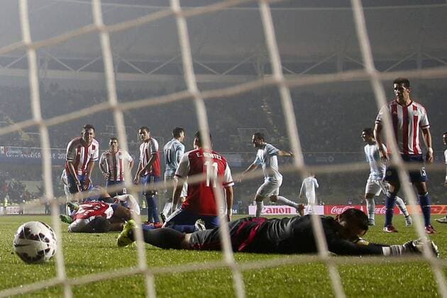 Copa America Championship 2015 . Argentina s player Gonzalo Higuain, center, celebrates with teammates scoring against Paraguay during the 2015 Copa America football championship semifinal match at the Ester Roa stadium in Concepcion . 30 06 2015 Andres Pina Photosport Argentina v Paraguay, semifinal Copa America 2015. 