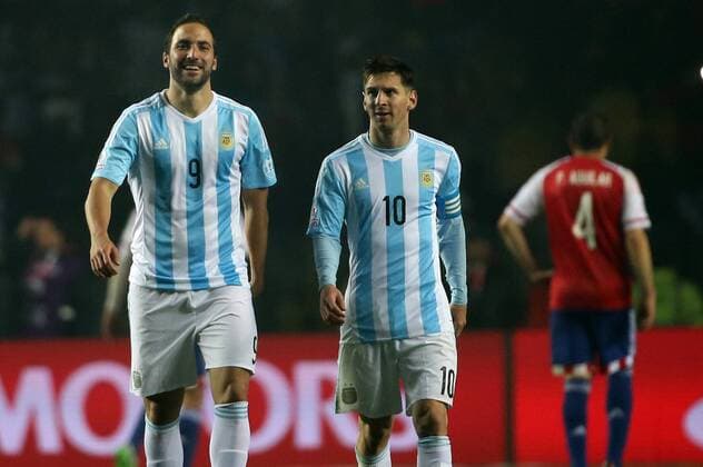 Copa America 2015. Argentina s player Gonzalo Higuain,left, celebrates his goal against Paraguay during the Copa America 2015 semifinals, at Bicentenario Ester Roa stadium. Concepcion . 30 06 2015 Dragomir Yankovic Photosport Argentina v Paraguay, semifinal Copa America 2015. 