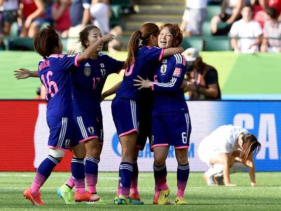 (150702) -- EDMONTON, Players of Japan celebrate the second goal during the semifinal against England at the 2015 FIFA Women s World Cup in Edmonton, Canada, July 1, 2015. Japan won 2-1 and was qualified for the final. ) (SP)CANADA-EDMONTON-FIFA-WOMEN S WORLD CUP-SEMIFINAL-JPN-ENG WangxYuguo 