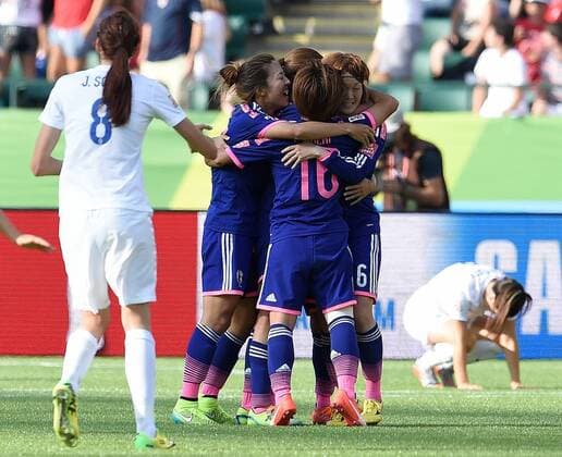 (150702) -- EDMONTON, Players of Japan celebrate the second goal during the semifinal against England at the 2015 FIFA Women s World Cup in Edmonton, Canada, July 1, 2015. Japan won 2-1 and was qualified for the final. ) (SP)CANADA-EDMONTON-FIFA-WOMEN S WORLD CUP-SEMIFINAL-JPN-ENG WangxYuguo 