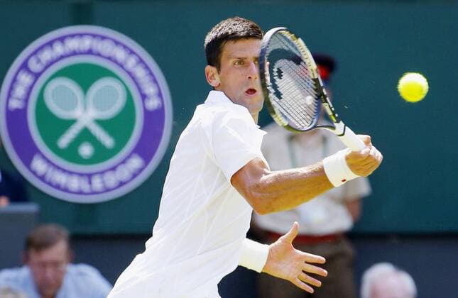 Djokovic runs through Wimbledon 2nd round Novak Djokovic of Serbia competes with Jarkko Nieminen of Finland during their Wimbledon second round match on July 1, 2015. Djokovic beat Nieminen 6-4, 6-2, 6-3. 