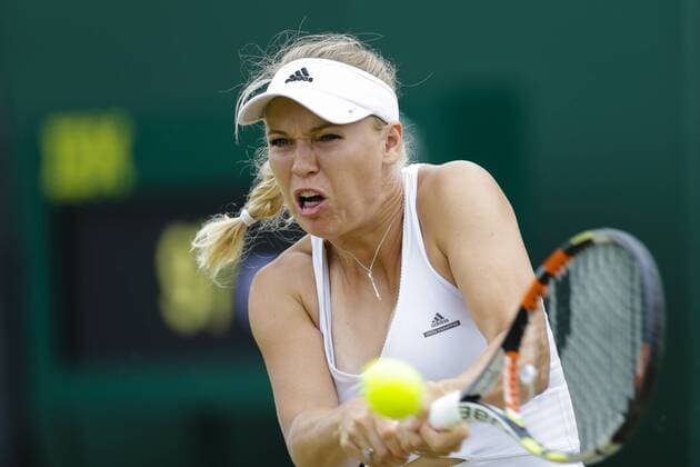 02.07.2015. Wimbledon, England. The Wimbledon Tennis Championships. Ladies& x2019; Singles second match between fifth seed Caroline Wozniacki (DEN) and Denisa Allertova (CZE). Caroline Wozniacki in action xCraigxMercerx  ActionPlus11636937