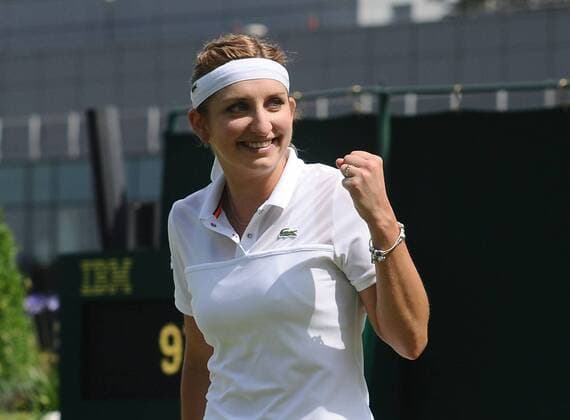 Tennis - 2015 Wimbledon Championships - Week One, Monday Women s Singles, Second Round Timea Bacsinszky (SUI) vs. Silvia Soler Espinosa (ESP) Timea Bacsinszky celebrates her victory on Court 18 COLORSPORT ANDREW COWIE 