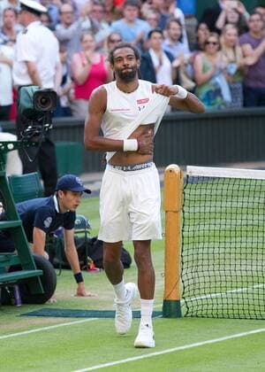 Dustin Brown (GER) jubelt und schlaegt auf das Tattoobild von seinem Vater,Jubel,Emotion, Tennis - Wimbledon 2015 - Grand Slam ITF ATP Tennis Herren WTA Tennis Damen - AELTC - London - - Great Britain - 2 July 2015. Juergen Hasenkopf