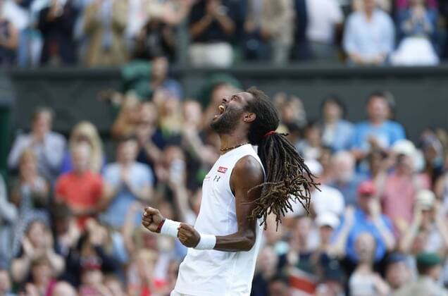 Dustin Brown of Germany celebrates during the gentlemen s second round match against Rafael Nadal of Spain at the 2015 Wimbledon Championships in Wimbledon, southwest London, July 2, 2015. Brown won the game 3-1. ) (SP)UK-WIMBLEDON-TENNIS-2015-DAY 4 YexPingfan 