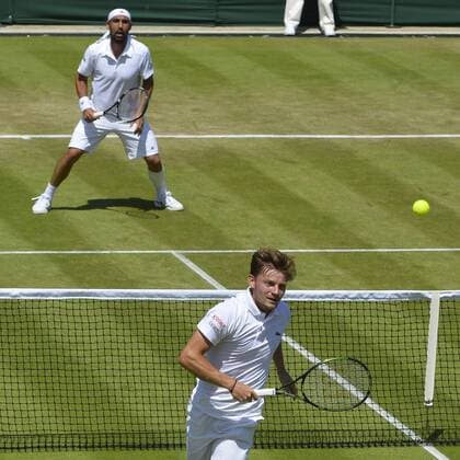 - LONDON, UNITED KINGDOM: Cypriot Marcos Baghdatis and Belgian David Goffin pictured in action during the third round of men single competition between Belgian David Goffin ATP Tennis Herren 15) and Cyprus Marcos Baghdatis (ATP 54) at the 2015 Wimbledon grand slam tennis tournament at the All England Tennis Club, in southwest London, Britain, Friday 03 July 2015. BENOITxDOPPAGNE  x04656581x