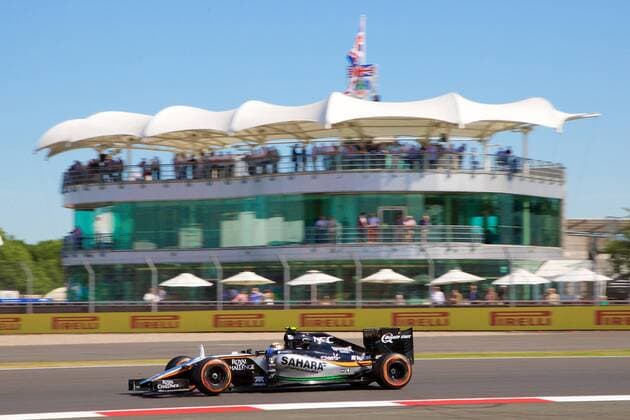 03.07.2015. Silverstone, Northants, England. Formula 1 British Grand Prix practice. Sergio Perez, India Sahara Force India F1 Team, speeds past the BRDC clubhouse. xTimxWilliamsx  ActionPlus11637160
