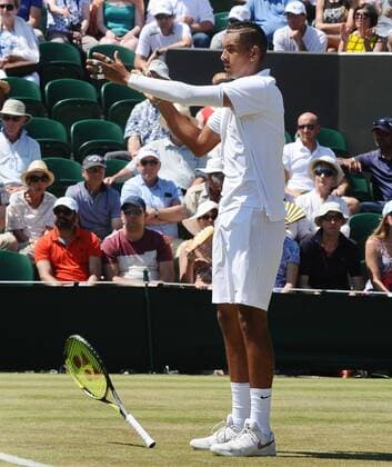 Tennis - 2015 Wimbledon Championships - Week One, Friday Men s Singles, Second Round Nick Kyrgios (AUS) vs. Milos Raonic (CAN) Nick Kyrgios drops his racket to the ground after a bad bounce on Court 2 COLORSPORT ANDREW COWIE 