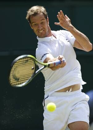 Richard Gasquet of France returns a ball during the men s singles third round against Grigor Dimitrov of Bulgaria at the 2015 Wimbledon Championships in Wimbledon, southwest London, July 3, 2015. Gasquet won 3-0. ) (SP)UK-WIMBLEDON-TENNIS-2015-DAY 5 YexPingfan 