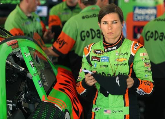 July 3, 2015 - Daytona Beach, FL, USA - Danica Patrick prepares to get in her race car in the garage area at Daytona International Speedway on Friday, July 3, 2015, in Daytona Beach, Fla. Daytona International Speedway - ZUMAm67_