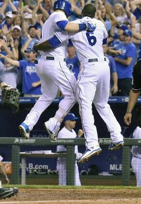 July 03, 2015: Kansas City Royals leftfielder Alex Gordon (4) and Kansas City Royals centerfielder Lorenzo Cain (6) celebrate after Cain scored the winning run during a Major League Baseball game between the Minnesota Twins and the Kansas City Royals at Kauffman Stadium in Kansas City. The Royals won in ten innings, 3-2. MLB Baseball Herren USA JUL 03 Twins at Royals Icon150703001 EDITORIAL USE ONLY