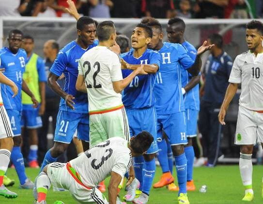 July 1st, 2015 - Mexico DF Paul Aguilar (22) and Honduras MF Jorge Claros (20) discuss the fight and calm the teams down during the 2015 Mexican national team Nationalteam United States Tour, Mexico vs Honduras at NRG Stadium in Houston, Texas. SOCCER: JUL 01 Mexico v Honduras Icon15070122 EDITORIAL USE ONLY