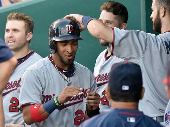 July 03, 2015: Minnesota Twins leftfielder Eddie Rosario (20) is congratulated by teammates after scoring the first run during a Major League Baseball game between the Minnesota Twins and the Kansas City Royals at Kauffman Stadium in Kansas City. MLB Baseball Herren USA JUL 03 Twins at Royals Icon150703013 EDITORIAL USE ONLY