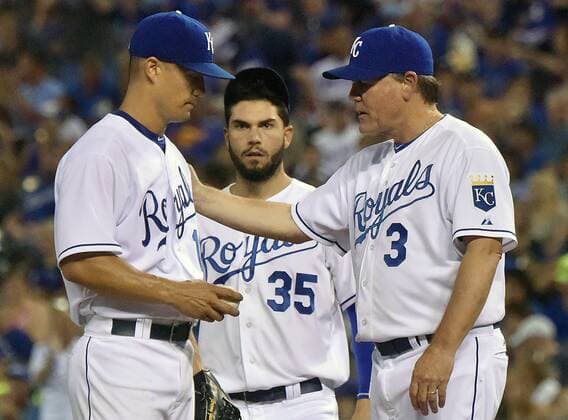 July 03, 2015: Kansas City Royals Manager Ned Yost relieves Kansas City Royals starting pitcher Jeremy Guthrie (11) in the seventh inning during a Major League Baseball game between the Minnesota Twins and the Kansas City Royals at Kauffman Stadium in Kansas City. The Royals won in ten innings, 3-2. MLB Baseball Herren USA JUL 03 Twins at Royals Icon150703031 EDITORIAL USE ONLY
