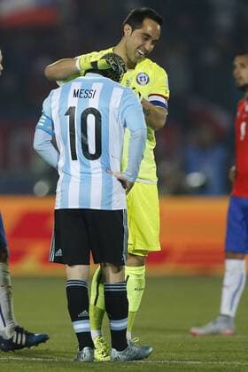 Football, Chile v Argentina. Copa America 2015 . Chile s player Claudio Bravo, embraced to Lionel Messi after the end game against Argentina for finals of the 2015 Copa America at Nacional stadium. Santiago, Chile. 04 07 2015 Marcelo Hernandez Photosport Chile v Argentina, Copa America 2015. 