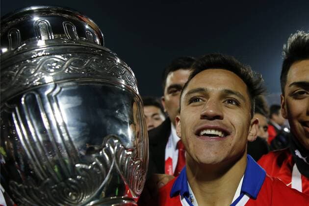 Football, Chile v Argentina. Copa America 2015 . Chile s player Alexis Sanchez, lifts the cup after winning the Copa America 2015 in a football match against Argentina at the Nacional stadium in Santiago, Chile. 04 07 2015 Andres Pina Photosport Chile v Argentina, Copa America 2015. 
