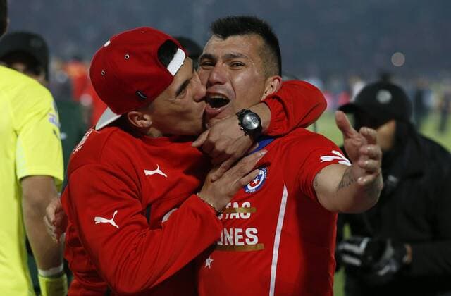 Football, Chile v Argentina. Copa America 2015 . Chile s player Gary Medel, right, celebrates after winning the Copa America 2015 in a football match against Chile,Argentina at the Nacional stadium in Santiago, Chile. 04 07 2015 Martin Thomas Photosport Chile v Argentina, Copa America 2015. 