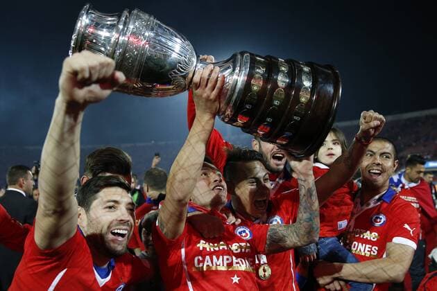 Football, Chile v Argentina. Copa America 2015 . Chile s players celebrate with the cup after winning the Copa America 2015 in a football match against Argentina at the Nacional stadium in Santiago, Chile. 04 07 2015 Andres Pina Photosport Chile v Argentina, Copa America 2015. 