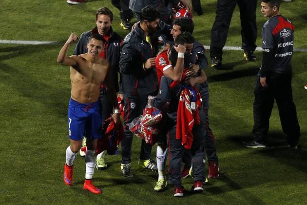 Football, Chile v Argentina. Copa America 2015 . Chile s player Alexis Sanchez, left , celebrates with teammates scoring against Argentina during the finals of the Copa America 2015 football match held at the Nacional stadium in Santiago, Chile. 04 07 2015 Paul Plaza Photosport Chile v Argentina, Copa America 2015. 