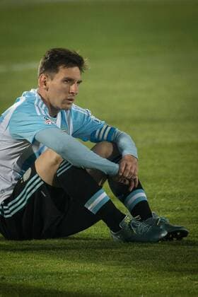 (150705) -- SANTIAGO, July 4, 2015 -- Lionel Messi of Argentina reacts after the final match of the Copa America Chile 2015 against Chile, at the National Stadium, in Santiago, capital of Chile, on July 4, 2015. Chile won the final match of the Copa America 2015 against Argentina after the penalty kick 4-1. Guillermo Arias) (ce) (SP)CHILE-SANTIAGO-COPA AMERICA-CHILE VS ARGENTINA PedroxMera 