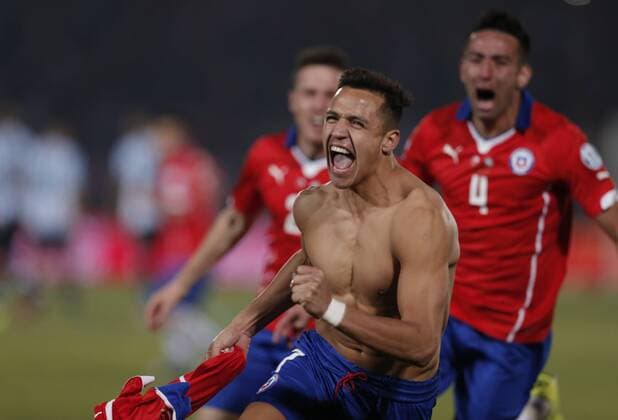 (150705) -- SANTIAGO, July 4, 2015 -- Alexis Sanchez of Chile celebrates after the final match of the Copa America Chile 2015 against Argentina, at the National Stadium, in Santiago, capital of Chile, on July 4, 2015. Chile won the final match of the Copa America 2015 against Argentina after the penalty kick 4-1. ) (ce) (CORRECTION)(SP)CHILE-SANTIAGO-COPA AMERICA-FINAL-CHILE VS ARGENTINA GuillermoxArias 