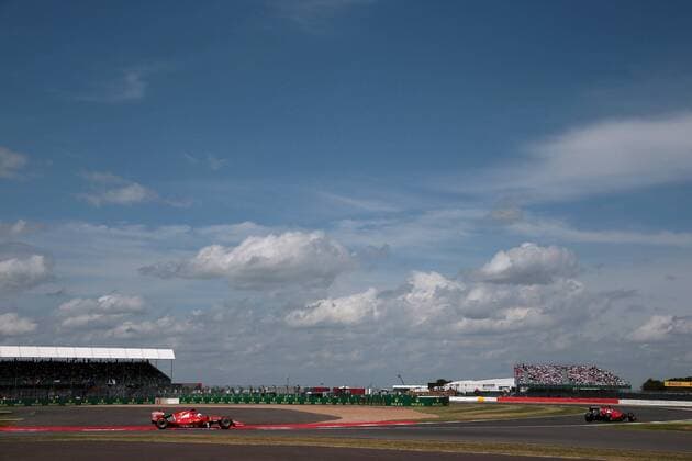 British Grand Prix, Silverstone 2 - 5 July 2015 05.07.2015- Race, Sebastian Vettel (GER) Scuderia Ferrari SF15-T and Kimi Raikkonen (FIN) Scuderia Ferrari SF15-T 