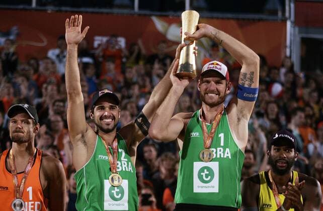 Alison Cerutti (2ndL) from Brazil celebrates with his teammate Bruno Oscar Schmidt (2ndR) during the FIVB Beach volleyball Beachvolleyball World Championships Male Final Match between Brazil vs Netherlands on July 5, 2015 in The Hague, Netherlands. Imago Paulo Amorim