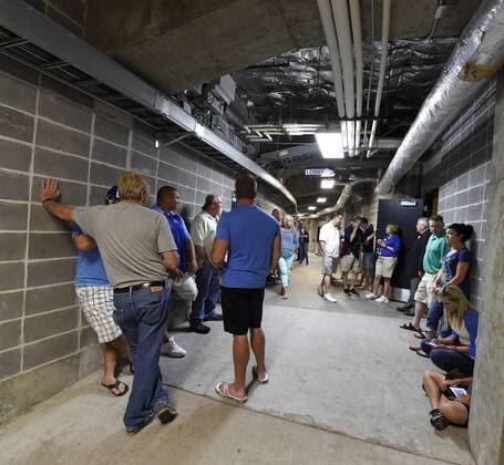 July 6, 2015 - Kansas City, MO, USA - Fans and employees wait out a tornado warning in the tunnels under Kauffman Stadium on Monday, July 6, 2015, in Kansas City, Mo. Tampa Bay Rays at Kansas City Royals game rained out - ZUMAm67_