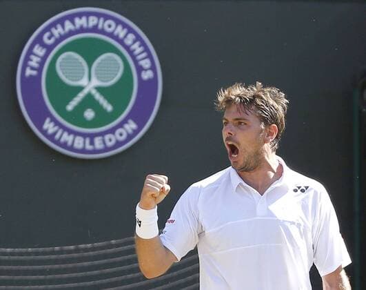 Wawrinka through to Wimbledon quarterfinals Stan Wawrinka of Switzerland celebrates after taking a point during a Wimbledon fourth round match against David Goffin of Belgium on July 6, 2015. Wawrinka won 7-6(3), 7-6(7), 6-4 to advance to the quarterfinals. 
