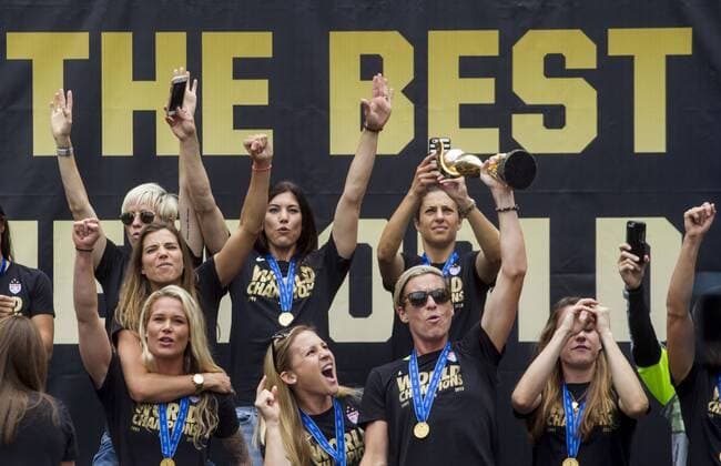 July 7, 2015 - Los Angeles, California, U.S - Members of U.S. women s soccer team cheer their fans during a rally to celebrate victory of the 2015 Women s World Cup during a rally at LA Live on July 7, 2015 in Los Angeles, California. The team defeated Japan 5-2 during Sunday s FIFA Women s World Cup in Canada. U.S. women s soccer team celebrates its World Cup victory - ZUMAc68_