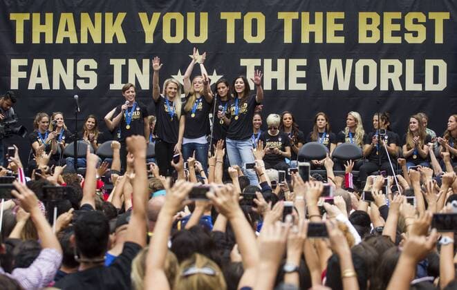 July 7, 2015 - Los Angeles, California, U.S - Members of U.S. women s soccer team cheer their fans during a rally to celebrate victory of the 2015 Women s World Cup during a rally at LA Live on July 7, 2015 in Los Angeles, California. The team defeated Japan 5-2 during Sunday s FIFA Women s World Cup in Canada. U.S. women s soccer team celebrates its World Cup victory - ZUMAc68_