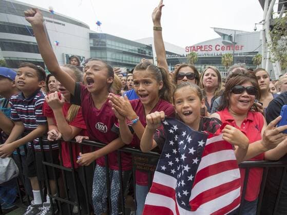 July 7, 2015 - Los Angeles, California, U.S - Fans of U.S. women s soccer team cheer during a rally to celebrate victory of the 2015 Women s World Cup during a rally at LA Live on July 7, 2015 in Los Angeles, California. The team defeated Japan 5-2 during Sunday s FIFA Women s World Cup in Canada. U.S. women s soccer team celebrates its World Cup victory - ZUMAc68_