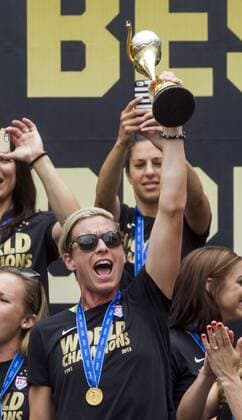July 7, 2015 - Los Angeles, California, U.S - Members of U.S. women s soccer team cheer their fans during a rally to celebrate victory of the 2015 Women s World Cup during a rally at LA Live on July 7, 2015 in Los Angeles, California. The team defeated Japan 5-2 during Sunday s FIFA Women s World Cup in Canada. U.S. women s soccer team celebrates its World Cup victory - ZUMAc68_