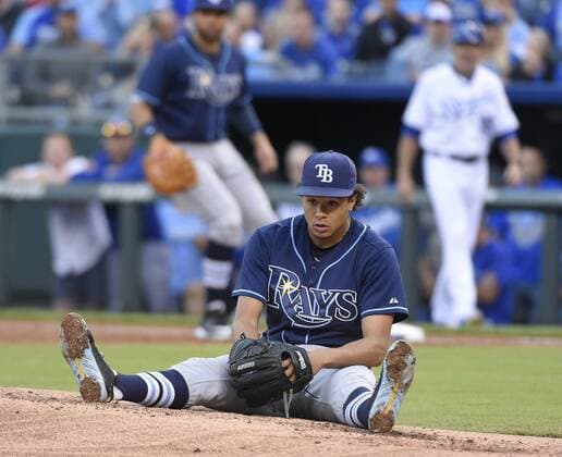 July 8, 2015 - Kansas City, MO, USA - Tampa Bay Rays starting pitcher Chris Archer sits on the mound after a line drive off the bat of the Kansas City Royals Alcides Escobar bounced away from him in the first inning for a single on Wednesday, July 8, 2015, at Kauffman Stadium in Kansas City, Mo. Tampa Bay at Kansas City - ZUMAm67_