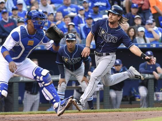 July 8, 2015 - Kansas City, MO, USA - The Tampa Bay Rays John Jaso scores before the ball reaches Kansas City Royals catcher Salvador Perez, left, in the third inning on Wednesday, July 8, 2015, at Kauffman Stadium in Kansas City, Mo. Tampa Bay at Kansas City - ZUMAm67_