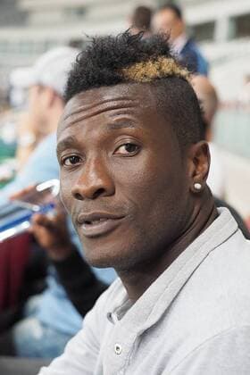 SHANGHAI, CHINA - JULY 08: (CHINA OUT) Ghana s striker Asamoah Gyan watches from the stand during the 2015 CFA Cup between Shanghai SIPG FC and Guangzhou R&F FC at Shanghai Stadium on July 8, 2015 in Shanghai, China. Asamoah Gyan will sign a contract with Chinese Super League s Shanghai SIPG Football Club.  CFP65149001 