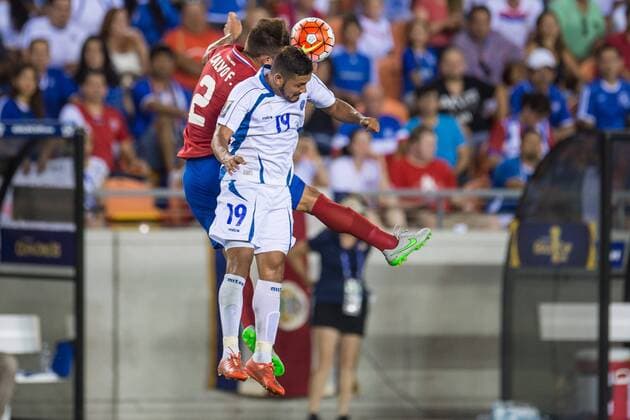 July 11, 2015: El Salvador forward Irvin Herrera (19) and Costa Rica defender Francisco Calvo (2) battle for a header during the 2nd half of an international CONCACAF Gold Cup soccer match between Costa Rica and El Salvador at BBVA Compass Stadium in Houston, TX. The game ended in a 1-1 draw... Soccer 2015: Costa Rica vs El Salvador JUL 11 - ZUMAc04_