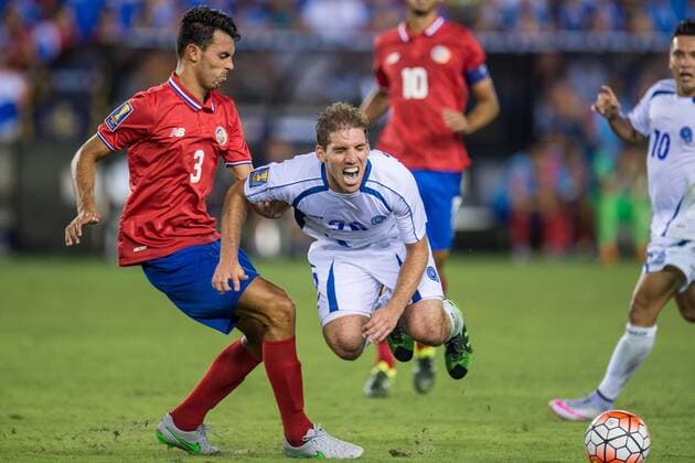 July 11, 2015: El Salvador midfielder Pablo Punyed (20) gets fouled by Costa Rica defender Giancarlo Gonzalez (3) during the 2nd half of an international CONCACAF Gold Cup soccer match between Costa Rica and El Salvador at BBVA Compass Stadium in Houston, TX. The game ended in a 1-1 draw... Soccer 2015: Costa Rica vs El Salvador JUL 11 - ZUMAc04_