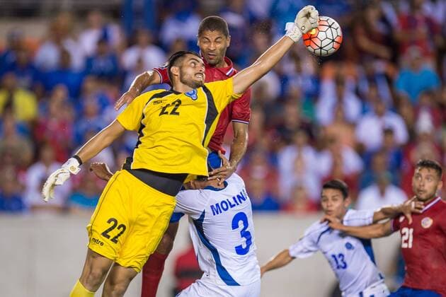 July 11, 2015: El Salvador goalkeeper Derby Carrillo (22) punches the ball away from a Costa Rica player as El Salvador defender Milton Molina (3) also defends on the play during the 1st half of an international CONCACAF Gold Cup soccer match between Costa Rica and El Salvador at BBVA Compass Stadium in Houston, TX. The game ended in a 1-1 draw... Soccer 2015: Costa Rica vs El Salvador JUL 11 - ZUMAc04_