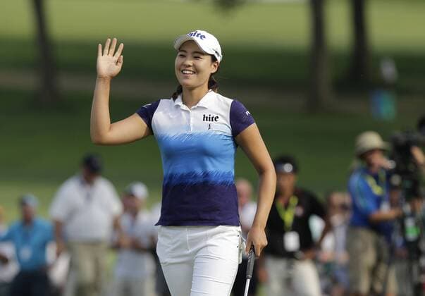 In Gee Chun of Korea smiles as she walks off of the 16th green after making a birdie putt in the final round of the LPGA Golf Damen U.S. Women s Open Championship at Lancaster Country Club in Lancaster, PA on July 12, 2015. Chun wins the U.S. Women s Open and her first LPGA major championship with a score of 8 under par.  NYP20150712130 JOHNxANGELILLO