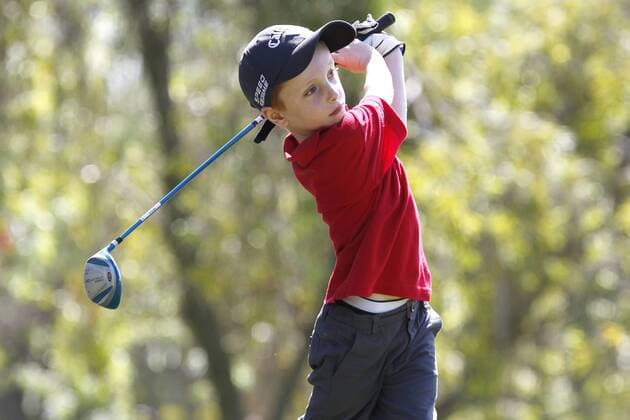 July 14, 2015 - San Diego, California, United States - July 14, 2015_San Diego, CA_USA_ Louis Rickett hits during the Junior World Golf Championships 6 and under division at Colina Park Golf Course. Photo by Louis Rickett hits during the Junior World Golf Championships 6 and under division at Colina Park Golf Course. - ZUMAs44_